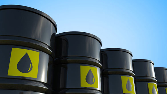 crude oil barrels with yellow label