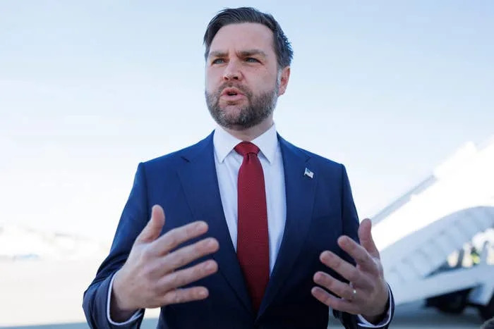 US Vice President JD Vance speaks to reporters before boarding Air Force Two