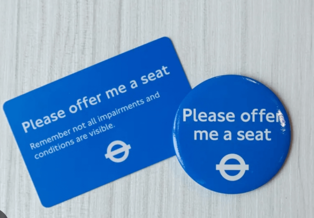 How effective is the 'Please offer me a seat' badge from the TFL website?