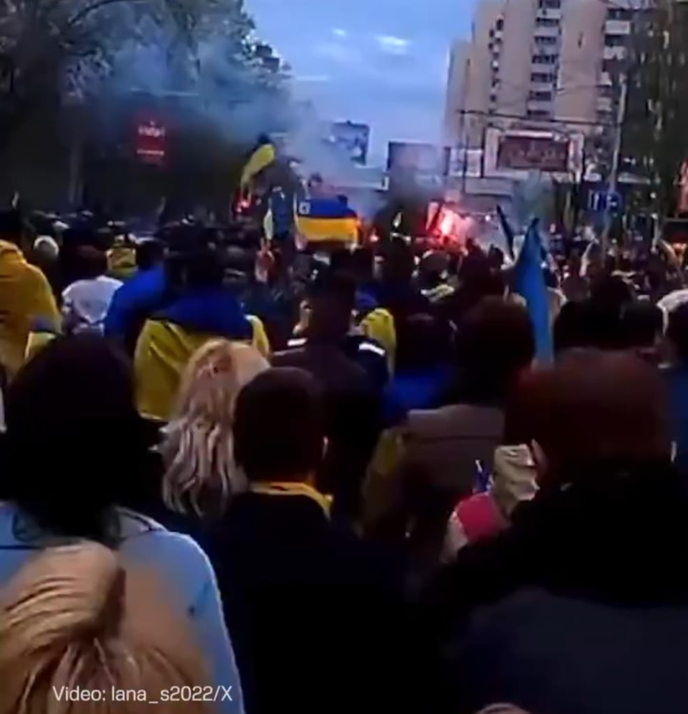 People chant "One. United. Independent Ukraine." Donetsk, 2014.