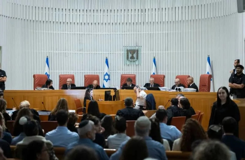 Supreme Court justices preside over a hearing at the High Court of Justice in Jerusalem, December 1, 2025 (credit: CHAIM GOLDBERG/FLASH90)