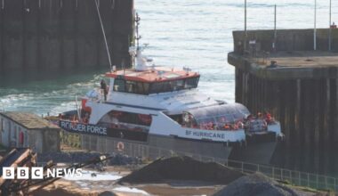 A group of people thought to be migrants are brought in to the Border Force compound in Dover, Kent, onboard a Border Force vessel.