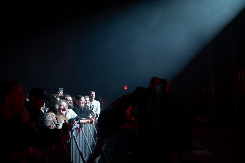 Concert attendees listen intently to Portugal. The Man’s performance.