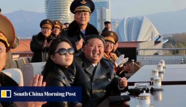 Kim flaunts daughter, missiles as North Korea eyes Russian jets