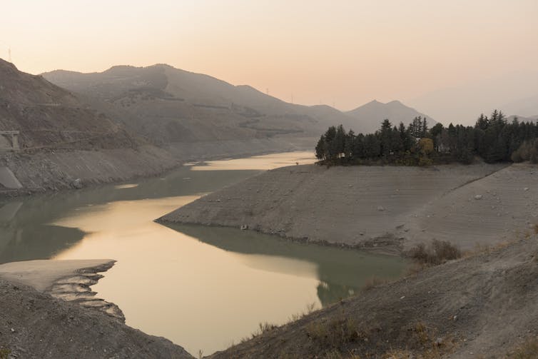 The equivalent of bathtub rings show how low the water has dropped in this reservoir.