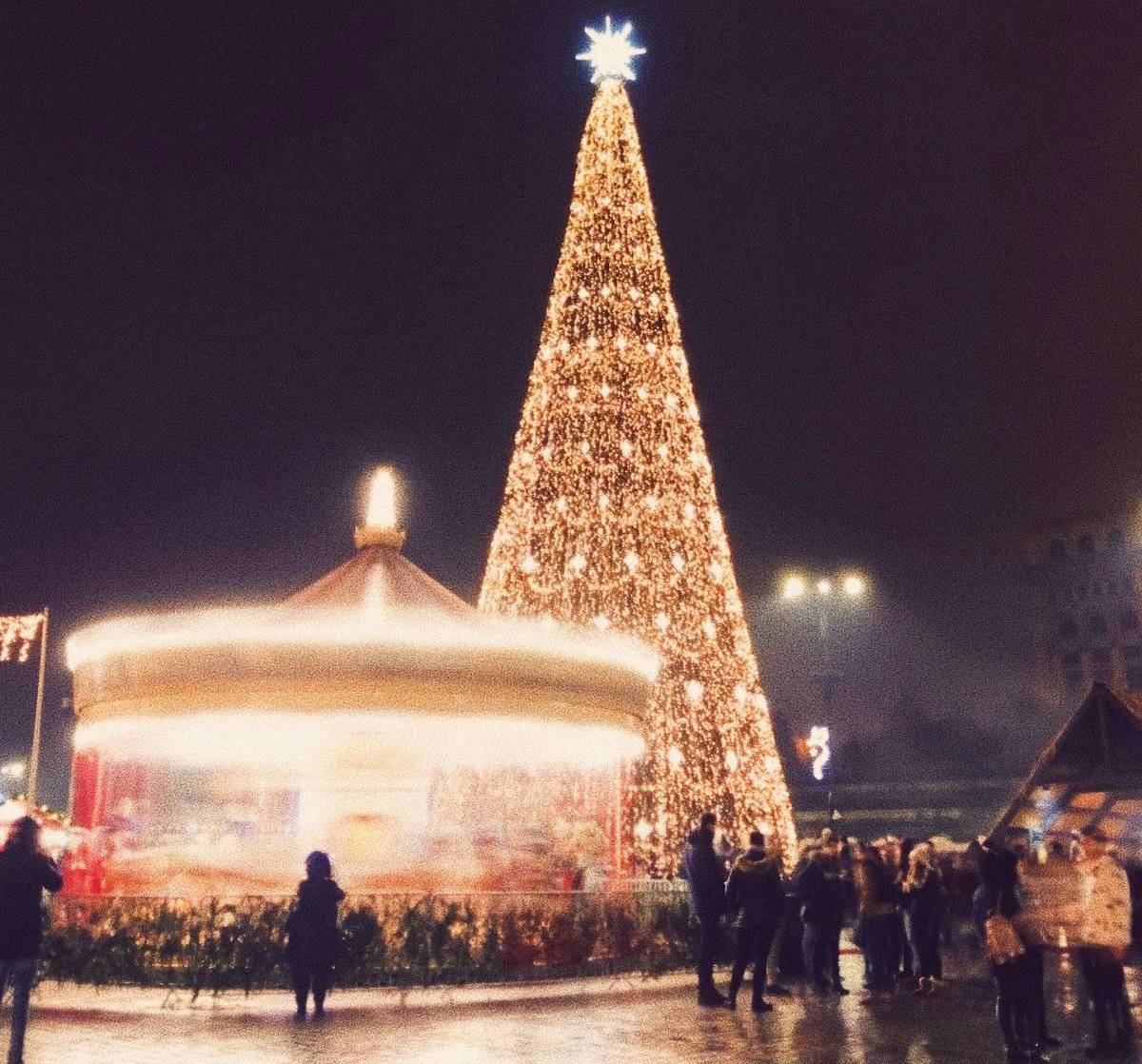 bucharest christmas market with carousel and tree