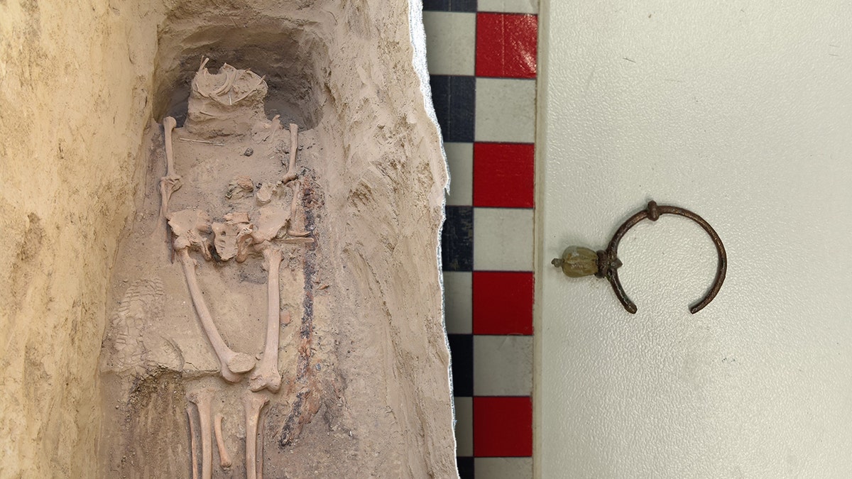 Split image of skeleton, small earring at grave