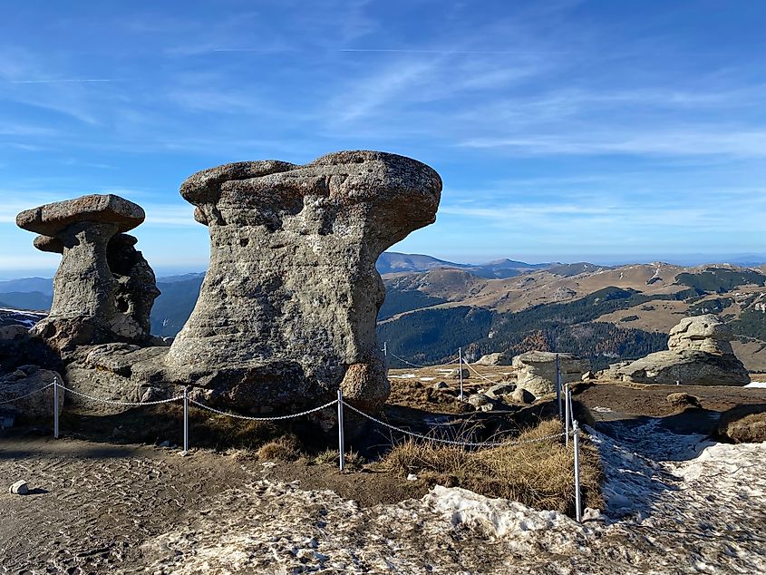 Mushroom-shaped stone pillars standing high on a mountainscape