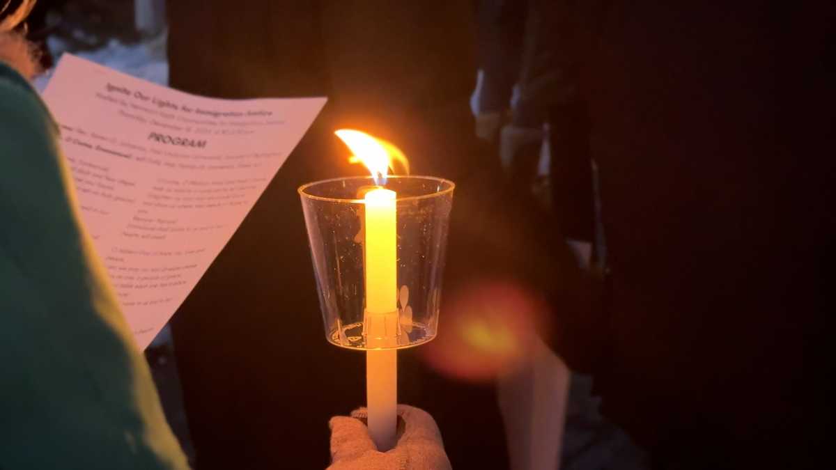 Candlelight vigil held for International Migrants Day in downtown Burlington