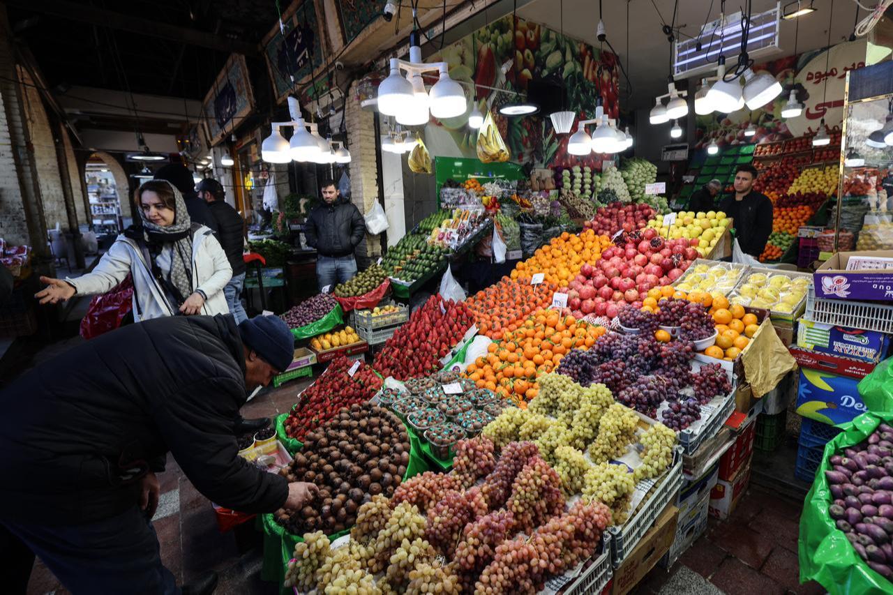 People shop for fruits at Tajrish Bazaar in the Iranian capital Tehran on December 29, 2025. (AFP Photo)