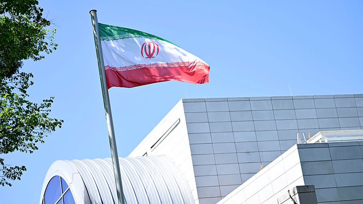 Iran's flag flies in front of the Iranian Embassy in Berlin.