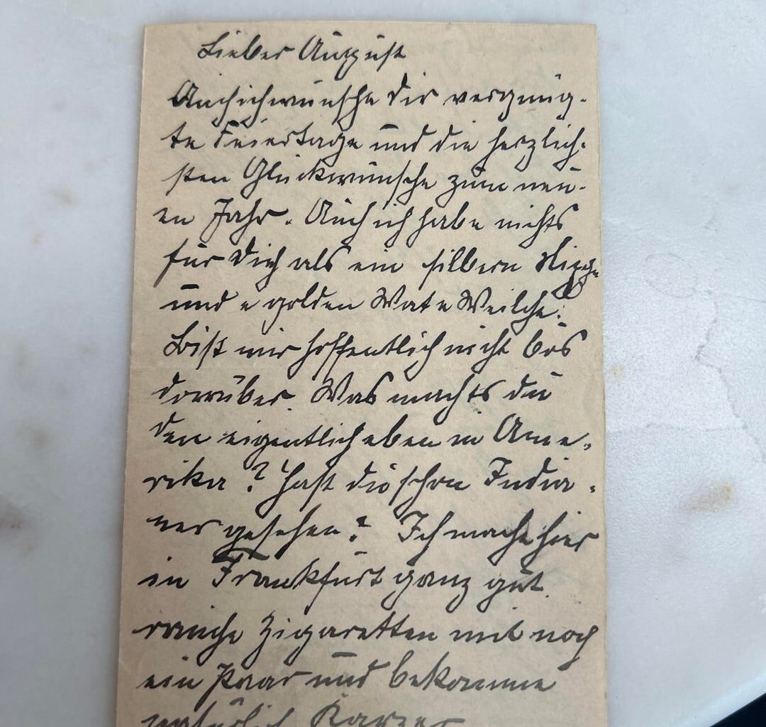 Found this in my family's stamp book, what does it say?