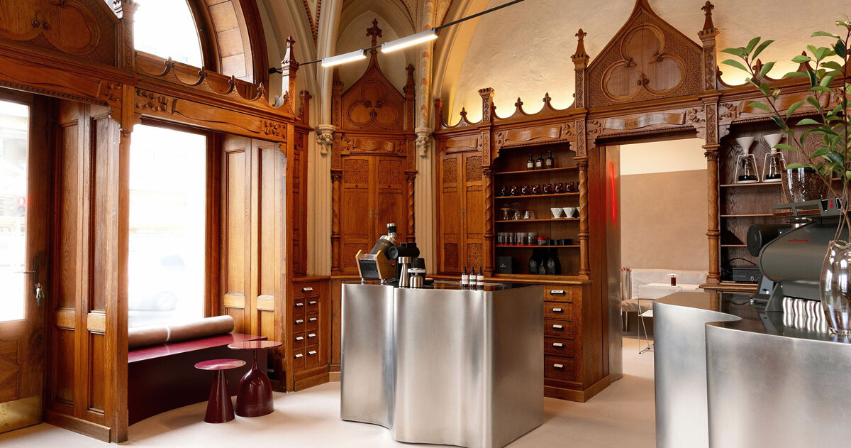 laboratorium café opens within revived neo-gothic apothecary in romania