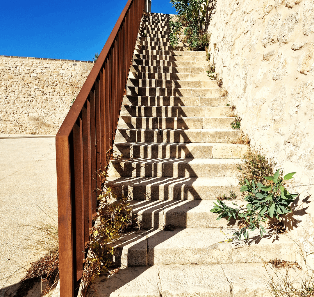 shadows on a stone stairway at Castillo de San Fernando, Alicante