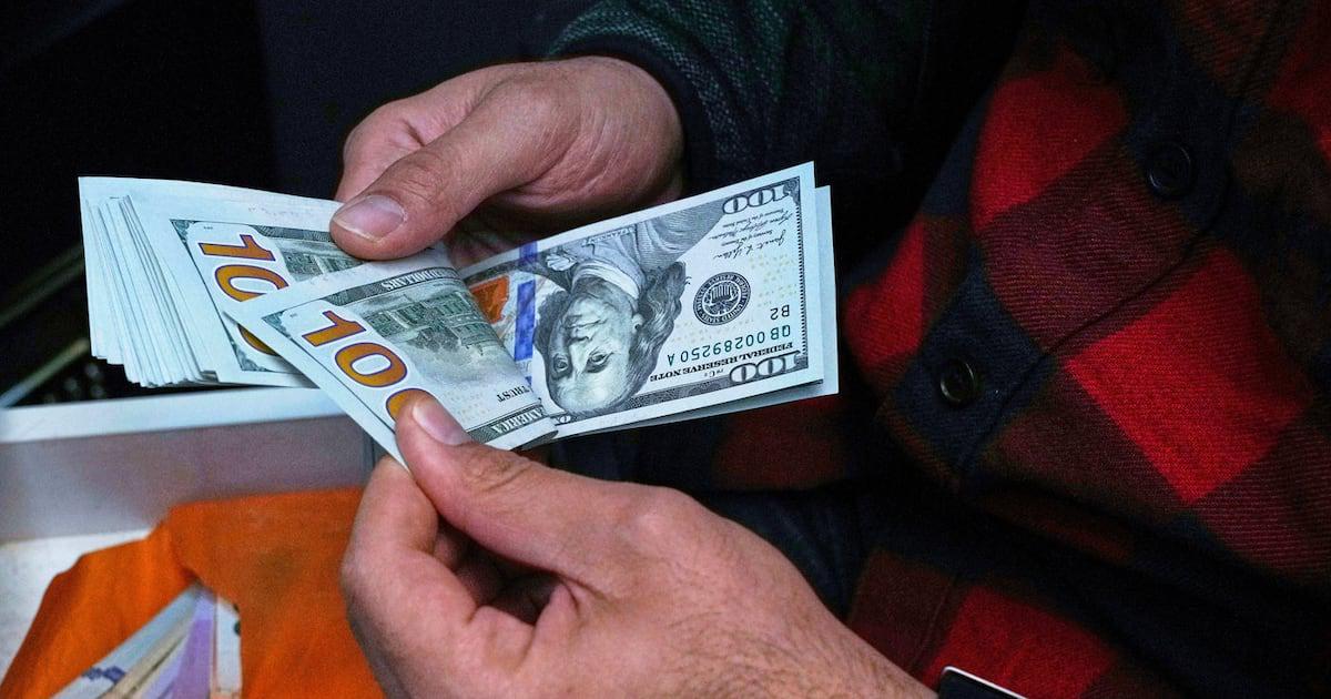 Iranian traders and shopkeepers protest as currency hits record low