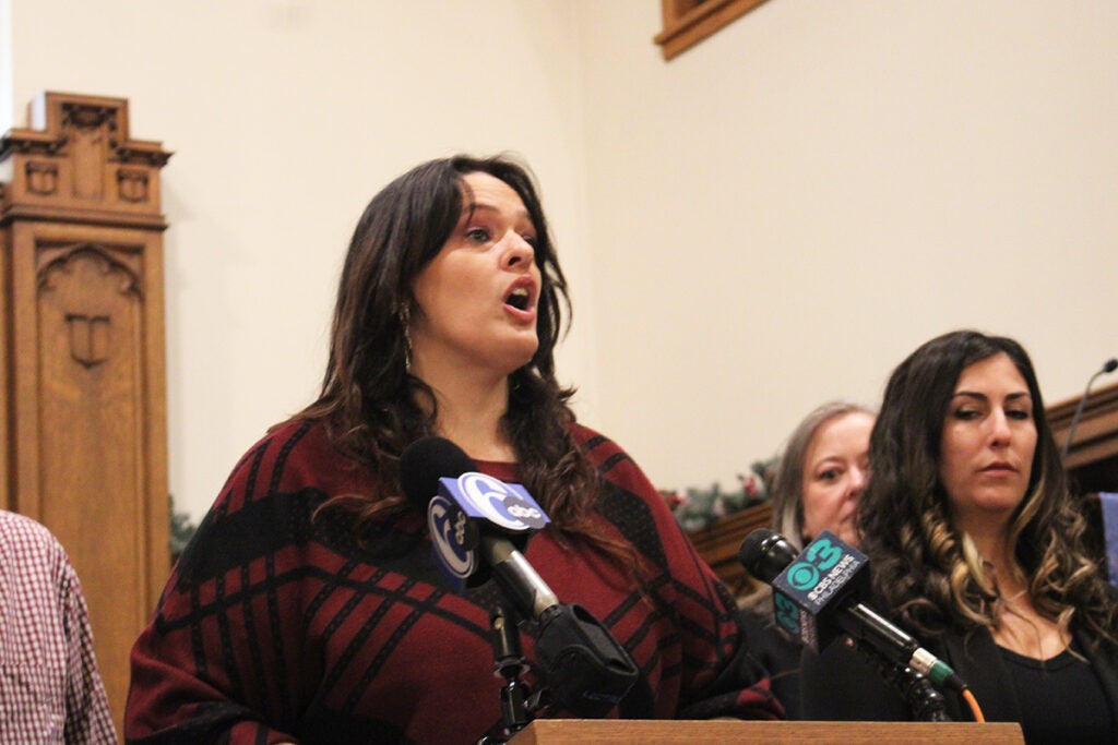 Stephanie Vincent speaking at podium