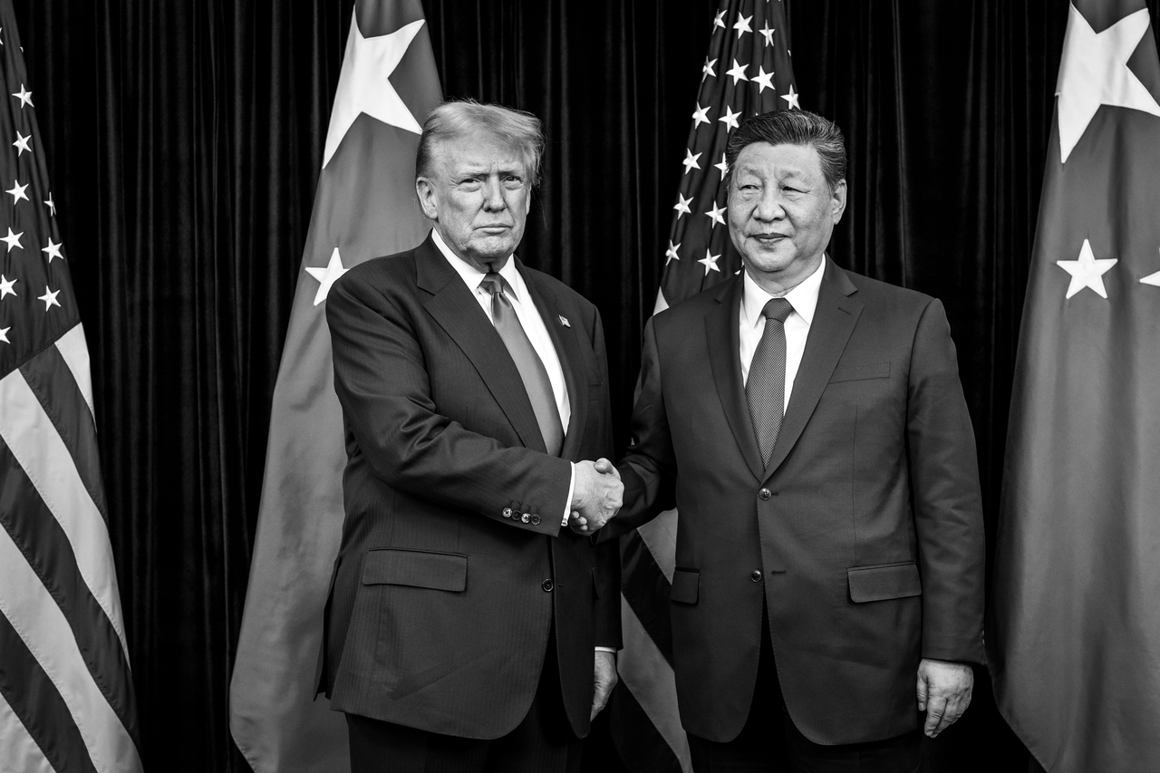 US President Donald Trump (left) greets Chinese President Xi Jinping before a bilateral meeting at the Gimhae International Airport terminal on Oct. 30 in Busan, South Korea. (White House)