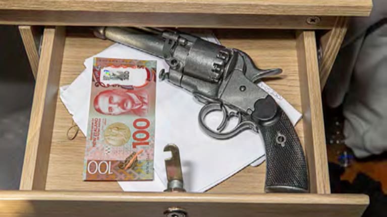 Officers found 273.6g of cannabis, packaged and ready for sale, and several imitation and modified air rifles.