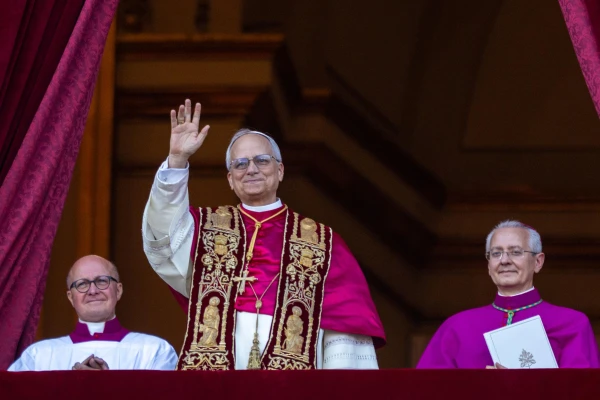 Pope Leo XIV waves to pilgrims in St. Peter’s Square shortly after his election on Thursday, May 8, 2025. Credit: Daniel Ibáñez/CNA