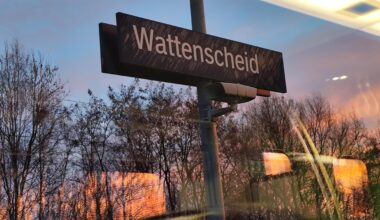 What caused these white marks on the sign?