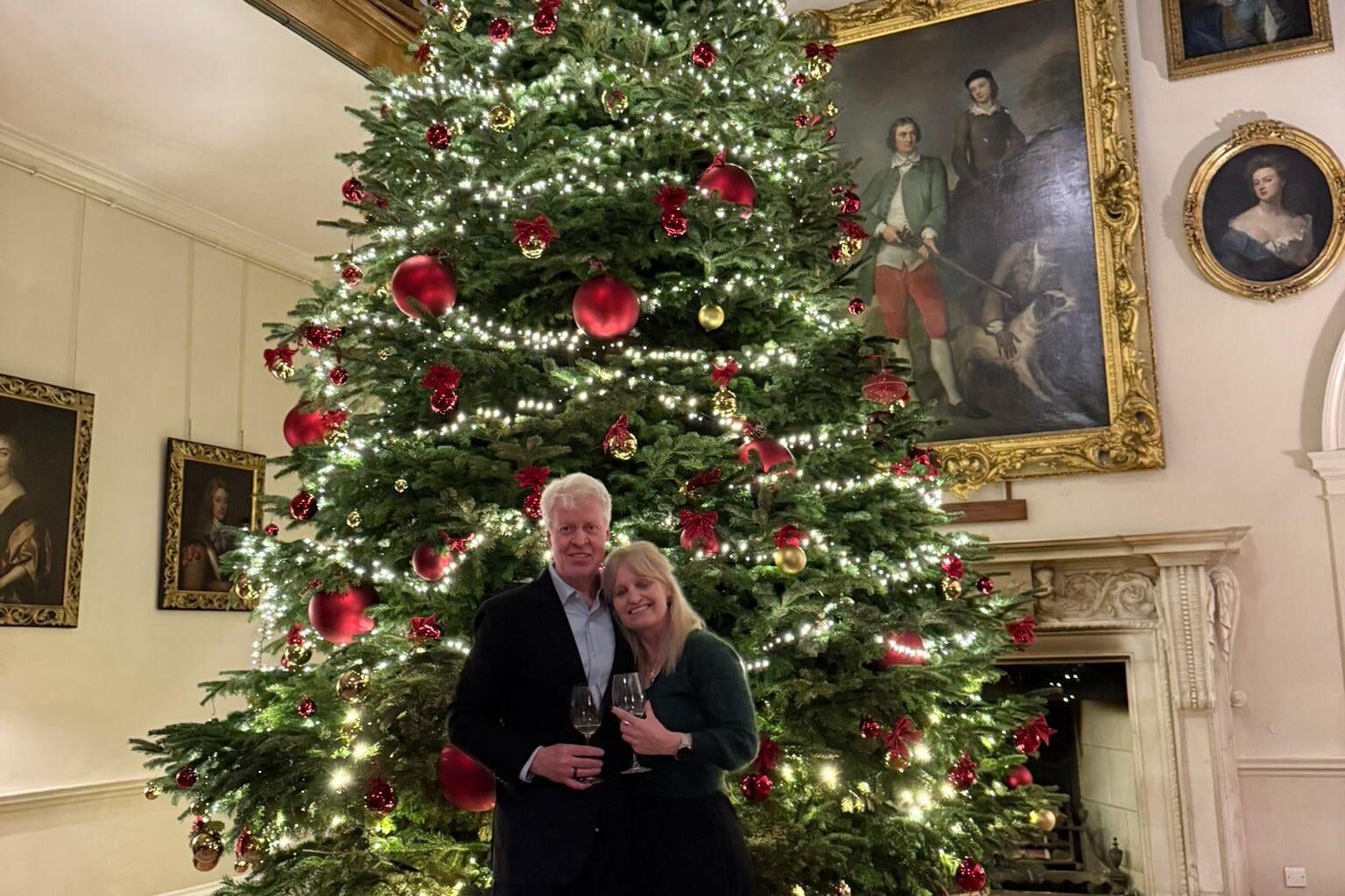 Charles Spencer shares photo with partner in front of their Christmas tree