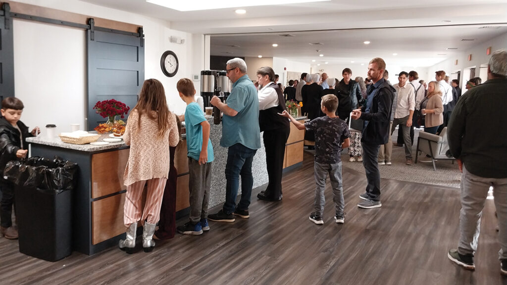 Members of Branch Community Church gather before Sunday morning worship Oct. 26. The Ridge­view and Branch congregations share a coffee hour in the lobby. — Eileen Kinch/AW