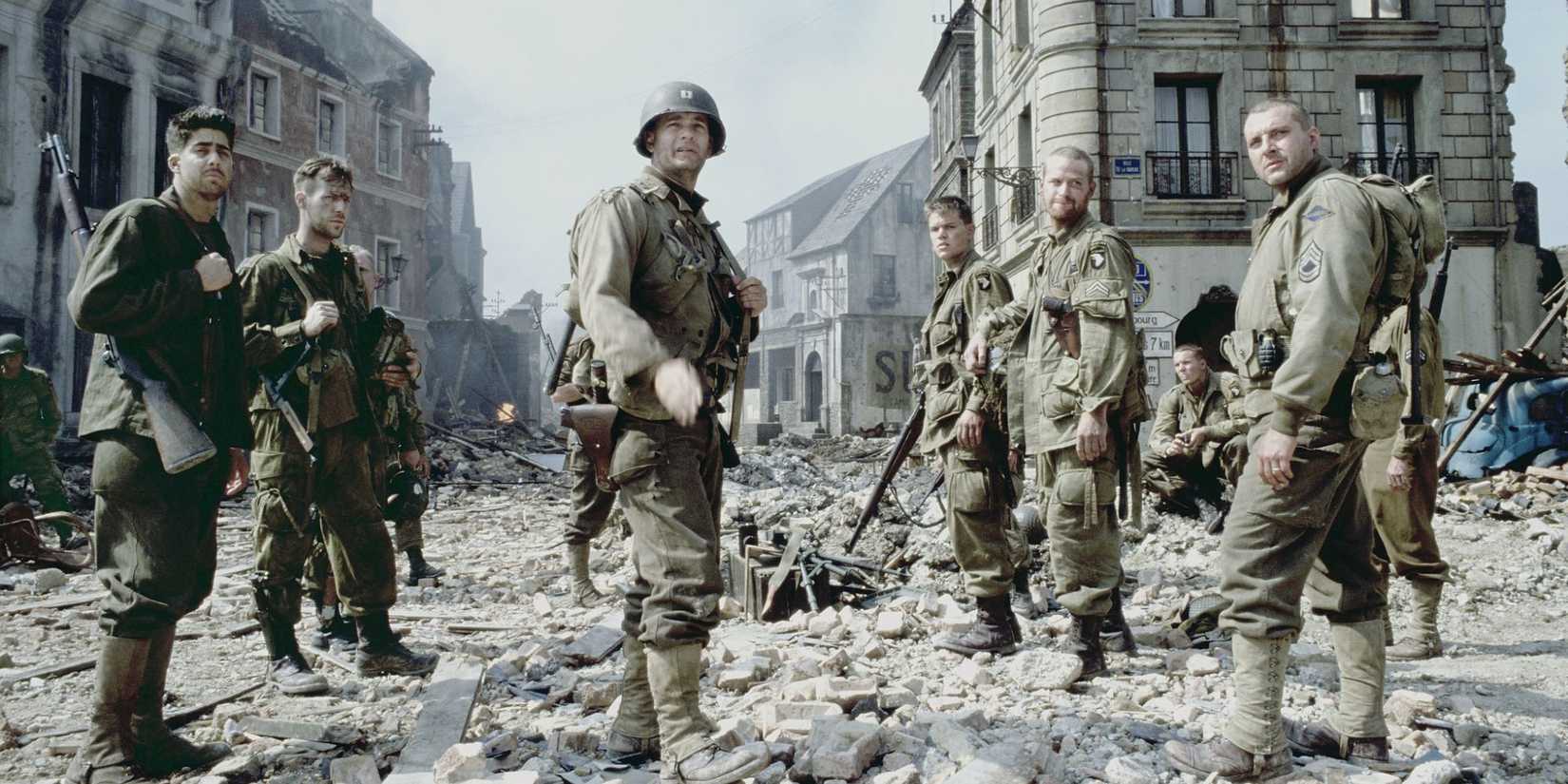 A group of soldiers standing in a wrecked city turning around and looking up in Saving Private Ryan.