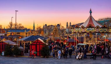 BRUSSELS, BELGIUM - DECEMBER 17, 2018: Evening view of the Grand Place (Grote Markt) with a christmas tree and illuminated buildings in Brussels, capital of Belgium