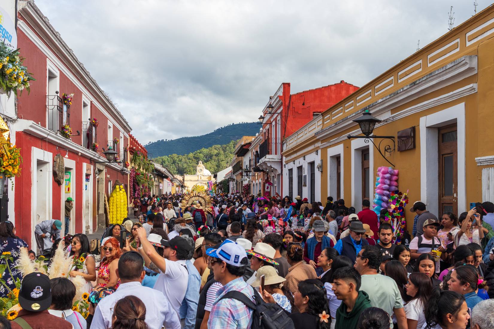 A crowd of tourists enjoying the 2025 Flower Festival in Antigua, Guatemala 