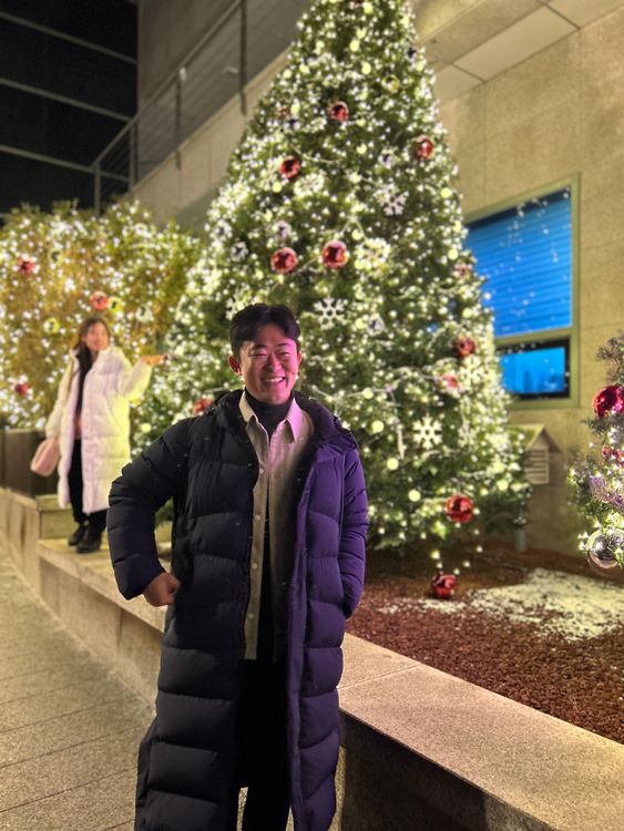 Il-yong Ju, now free in South Korea, with a Christmas tree