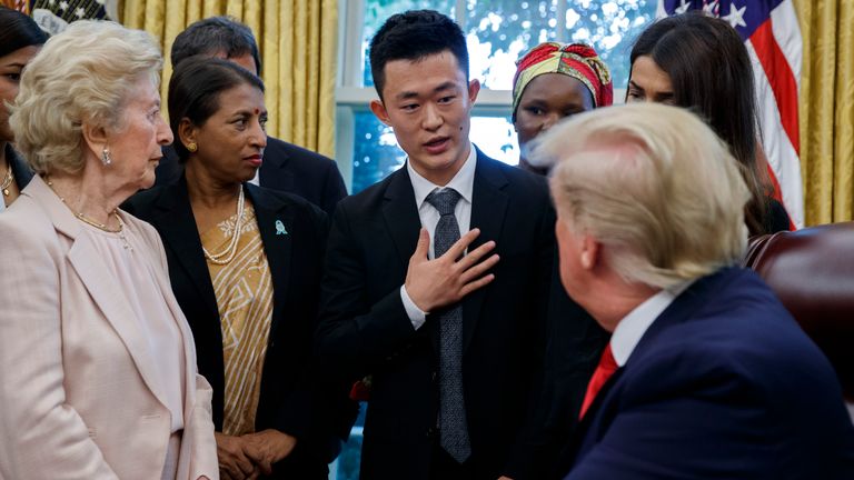 Il-yong Ju meeting Donald Trump in the Oval Office in 2019. Pic: AP