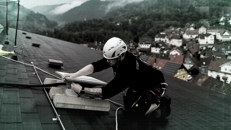 A Starlink satellite is installed on a roof in Forbach, Germany on 10 July 2024. Pic: AP/DPA/Philipp von Ditfurth