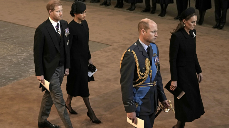 The Sussexes and the Waleses march together in cathedral