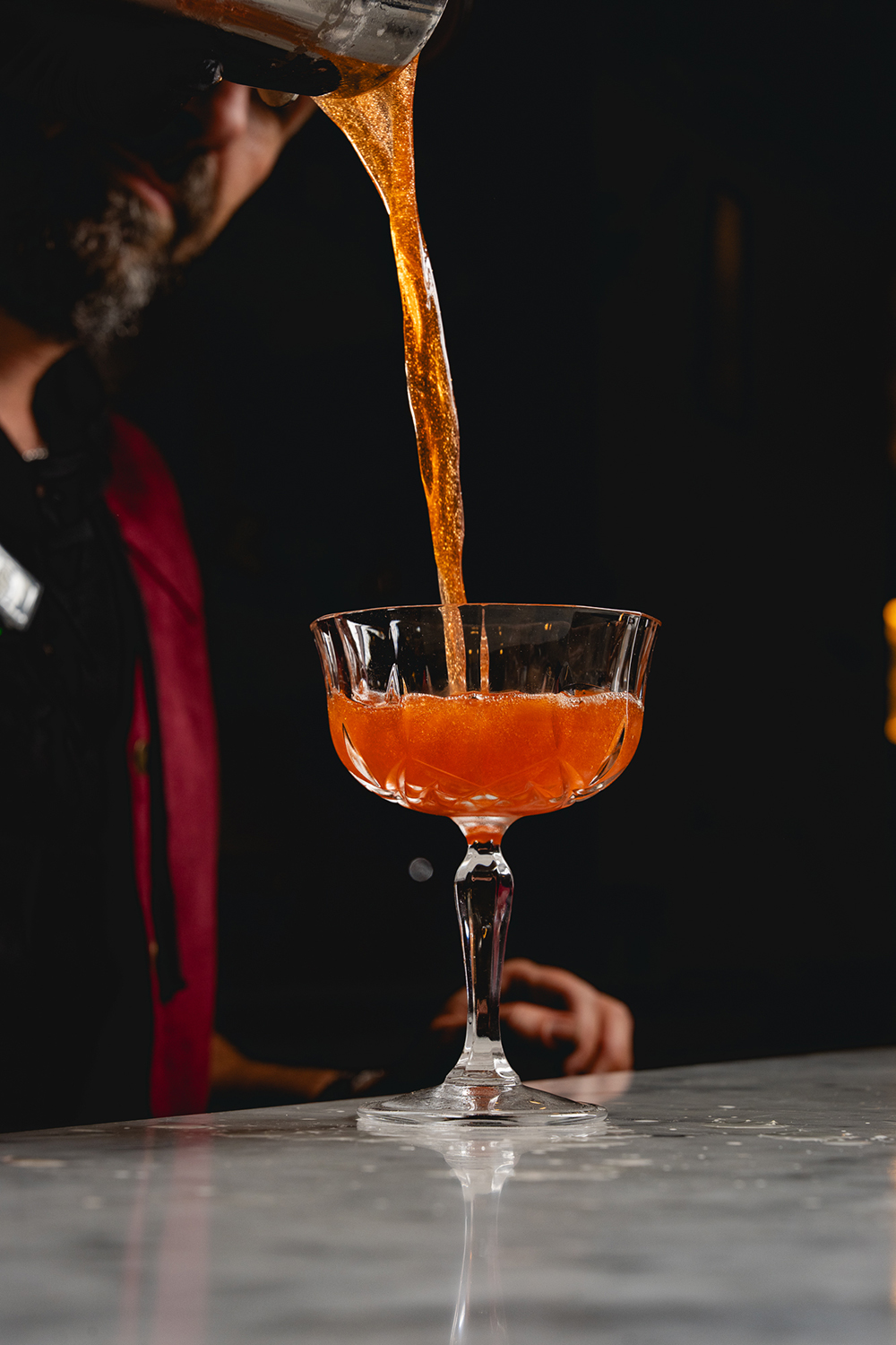 One of the custom cocktails in the full bar at...