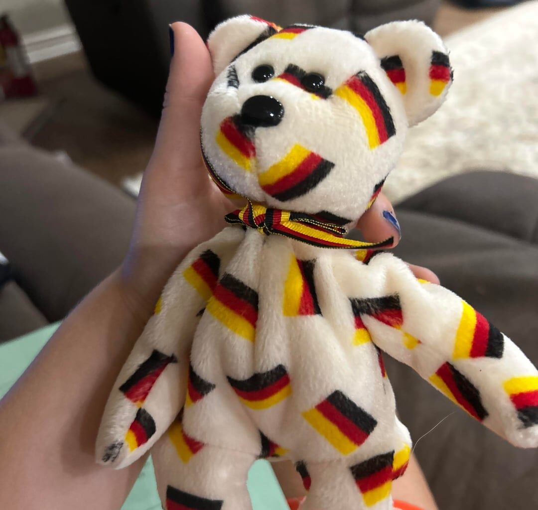 German beanie baby and painting of the flag