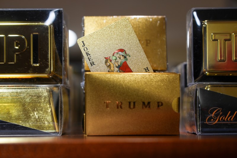 Gold Trump-branded playing cards for sale.