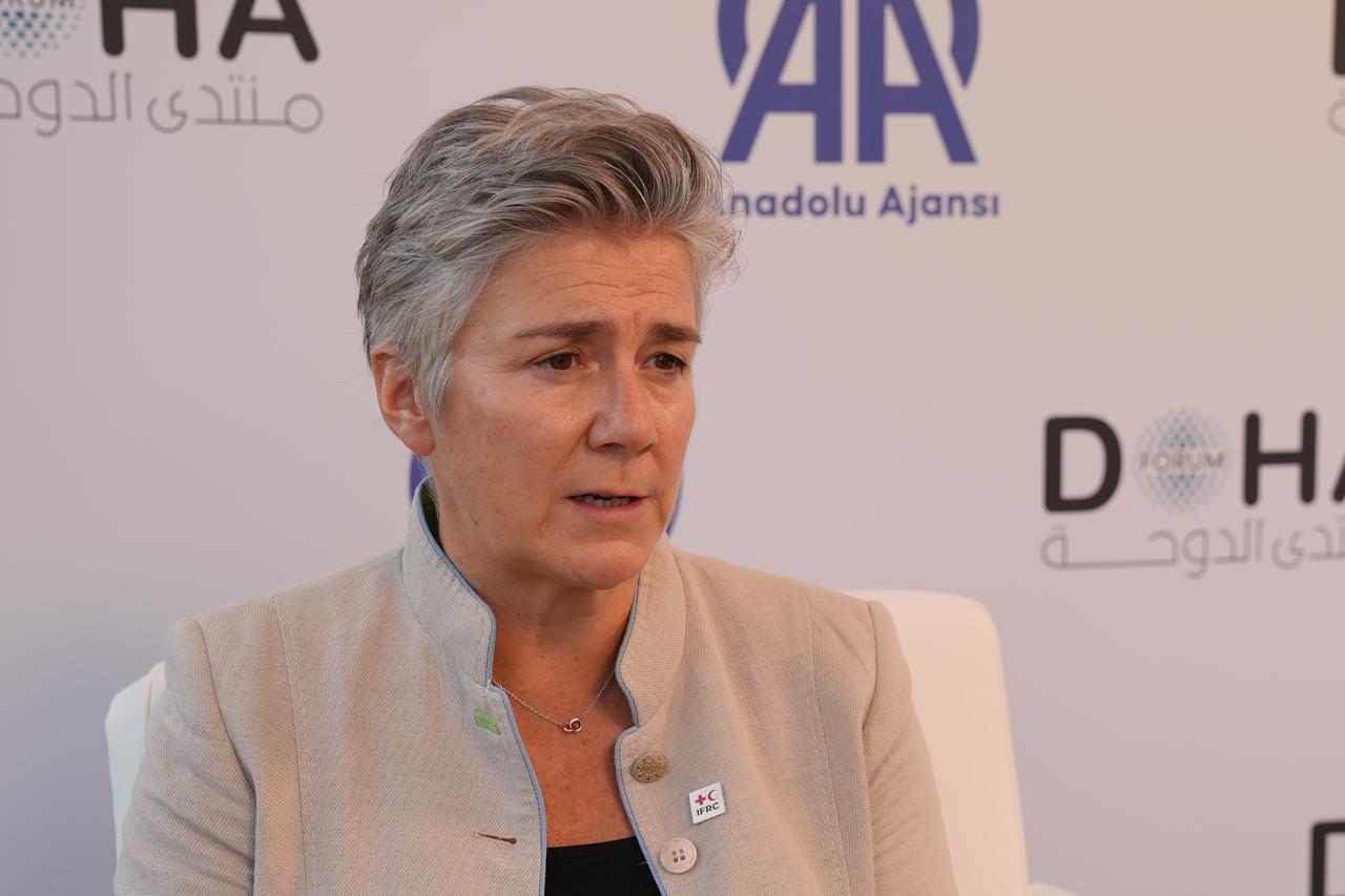 Caroline Holt, director of Climate, Disaster and Crisis at the International Federation of Red Cross and Red Crescent Societies (IFRC), speaks during an interview on the sidelines of the Doha Forum in Doha, Qatar on Dec. 6, 2025. (AA Photo)