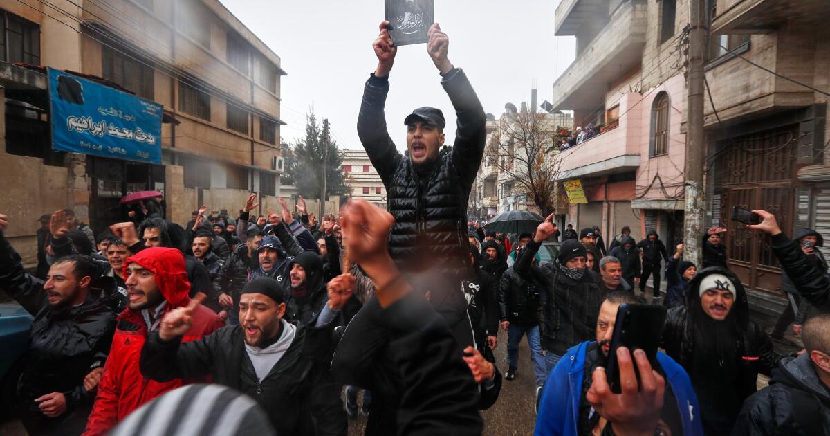 Hundreds mourn in Syria's Homs after deadly mosque bombing
