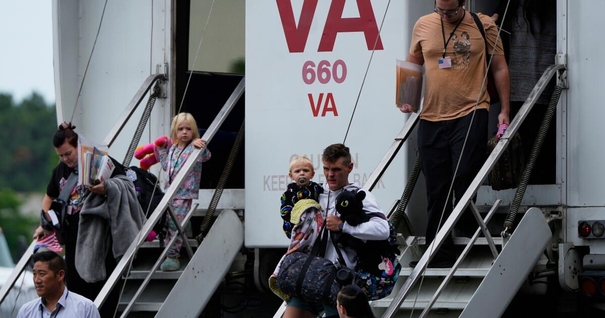 South African authorities raid a U.S. processing center for white migrants