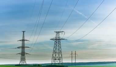 Image shows power lines in a rural setting.