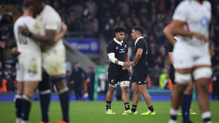 Wallace Sititi, left, and Anton Lienert-Brown shake hands after losing to England at Twickenham in November.