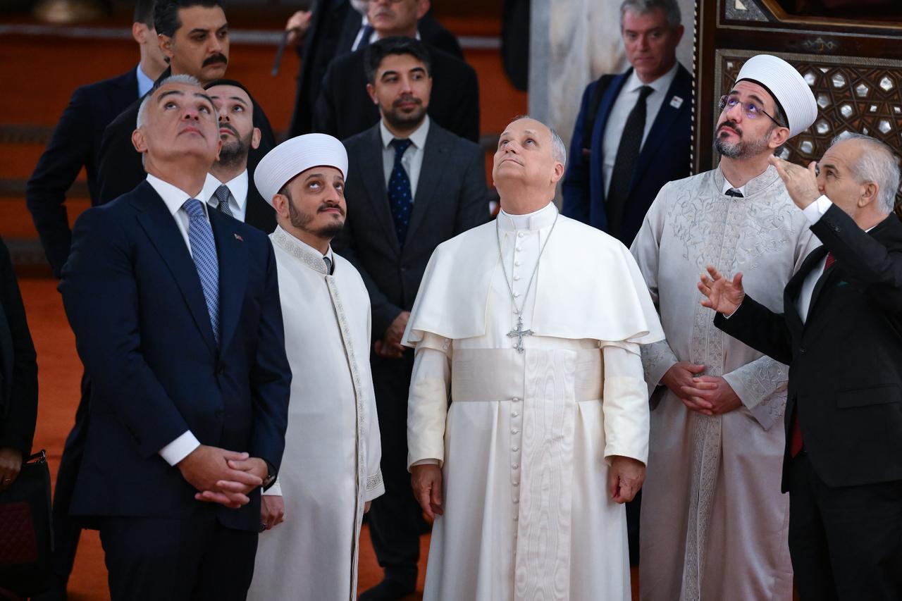 Pope Leo XIV visits the Sultanahmet Mosque in Istanbul, Turkiye on November 29, 2025. Turkish Culture and Tourism Minister Mehmet Nuri Ersoy and other mosque officials accompanied the Pope. (AA Photo)