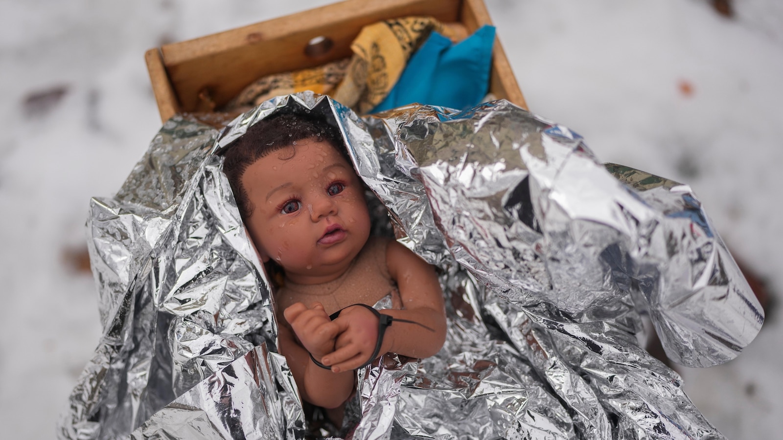 Church nativity scenes add zip ties, gas masks and ICE to protest immigration raids