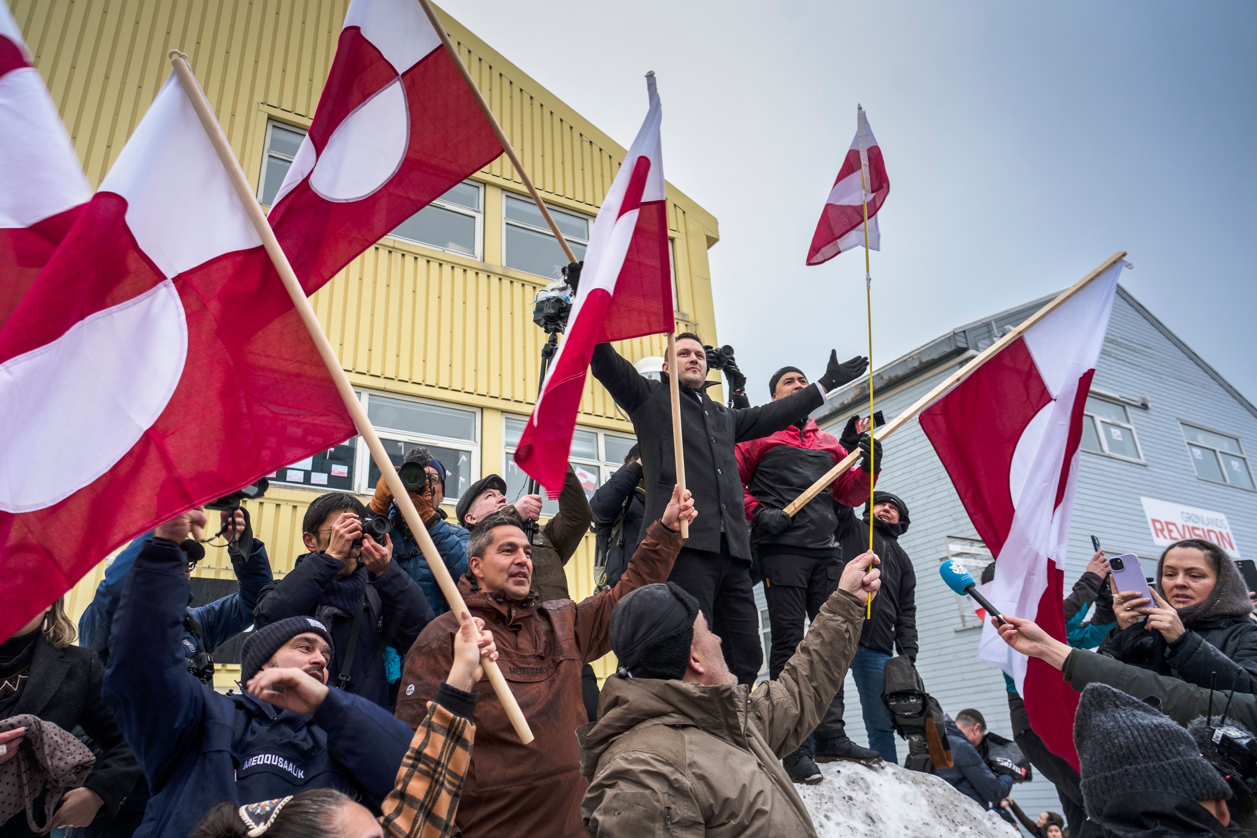 Prime Minister Jens-Frederik Nielsen and others protest US actions in Nuuk, Greenland.