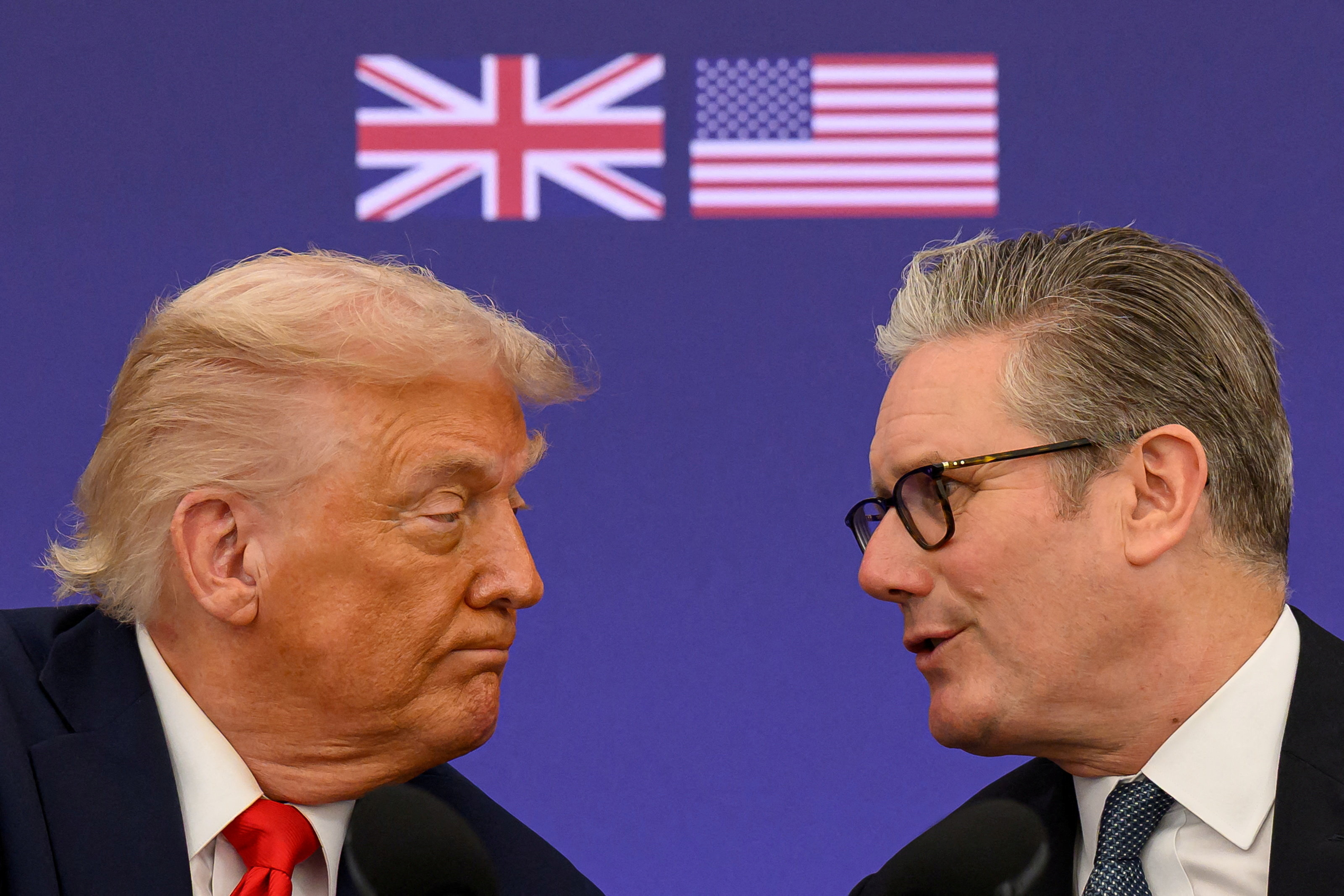 U.S. President Donald Trump and British Prime Minister Keir Starmer at a press conference, with the British and American flags in the background.