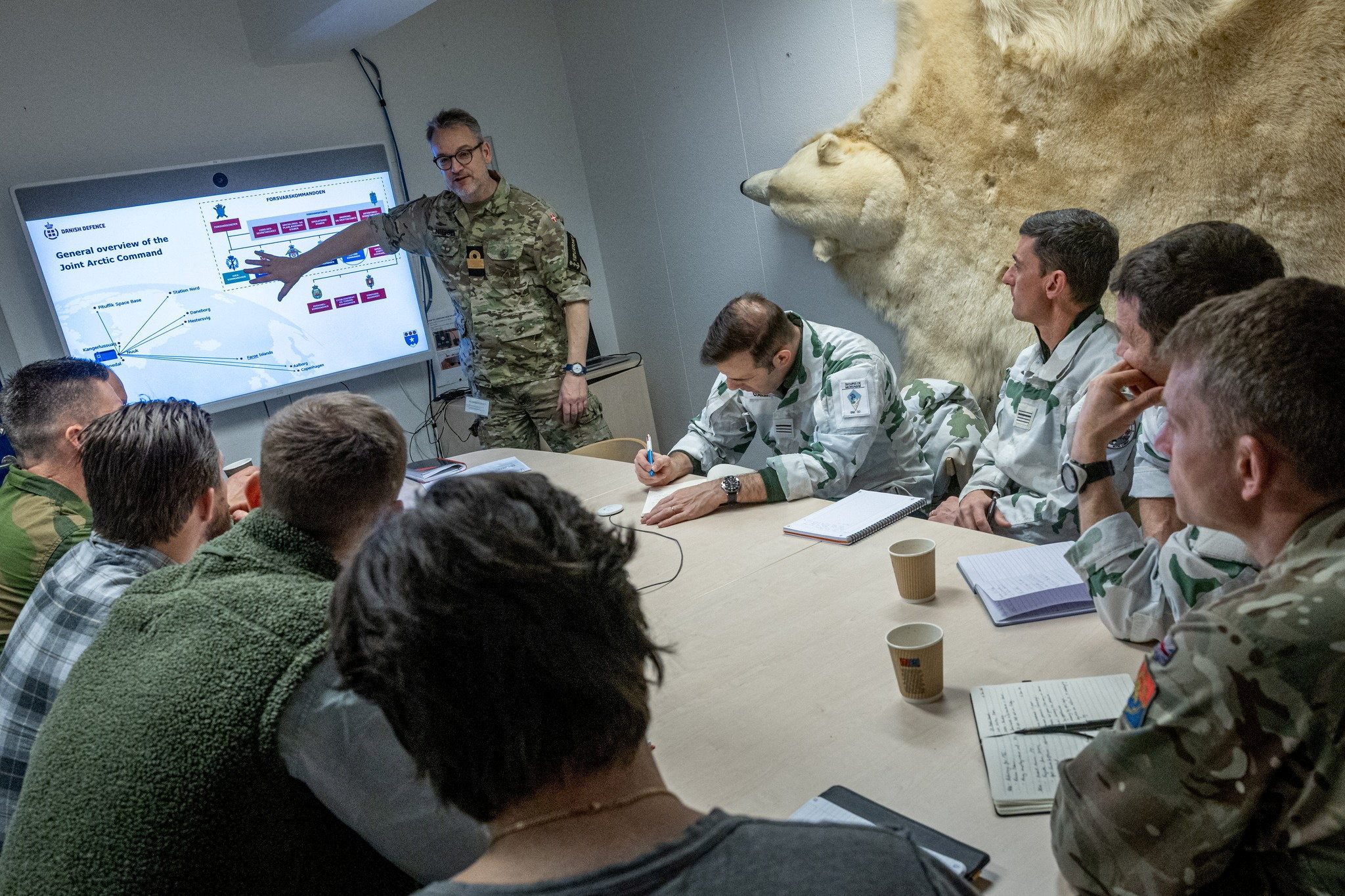 European soldiers attend a briefing during a military exercise in Nuuk, Greenland, on Friday