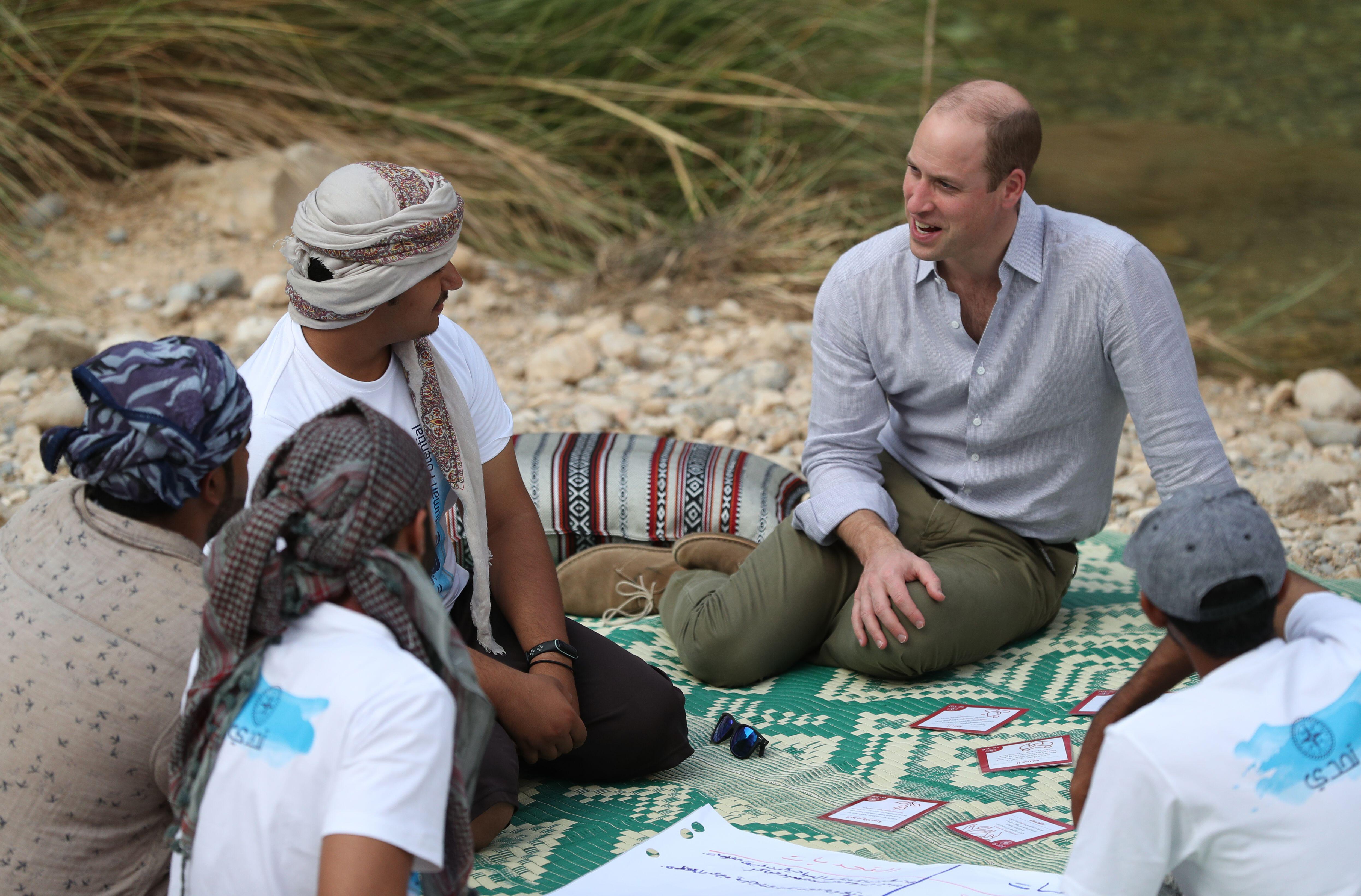 The Duke of Cambridge conversing with members of Outward Bound Oman during an event.