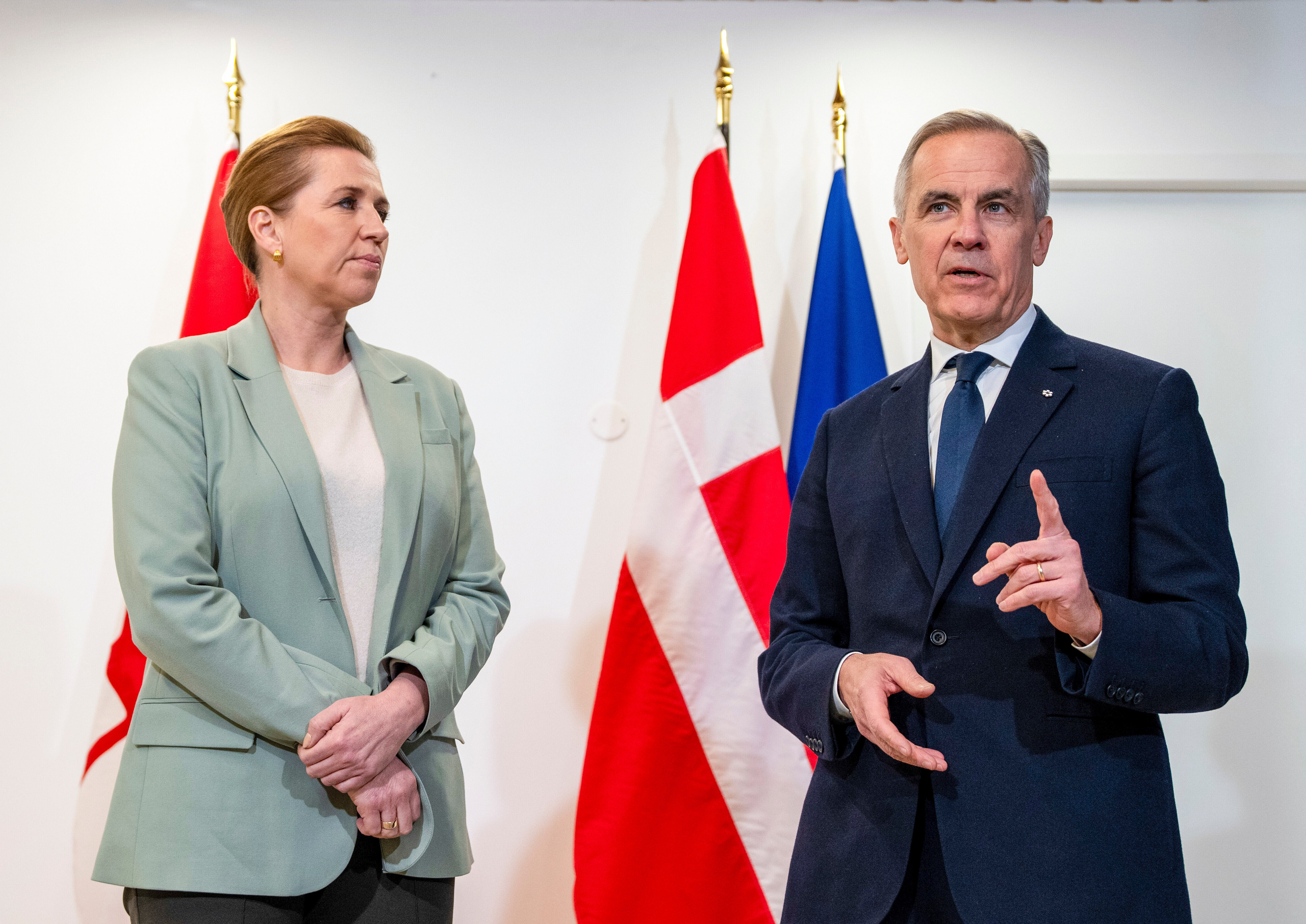 Mette Frederiksen and Mark Carney at the Canadian Embassy in Paris on Tuesday
