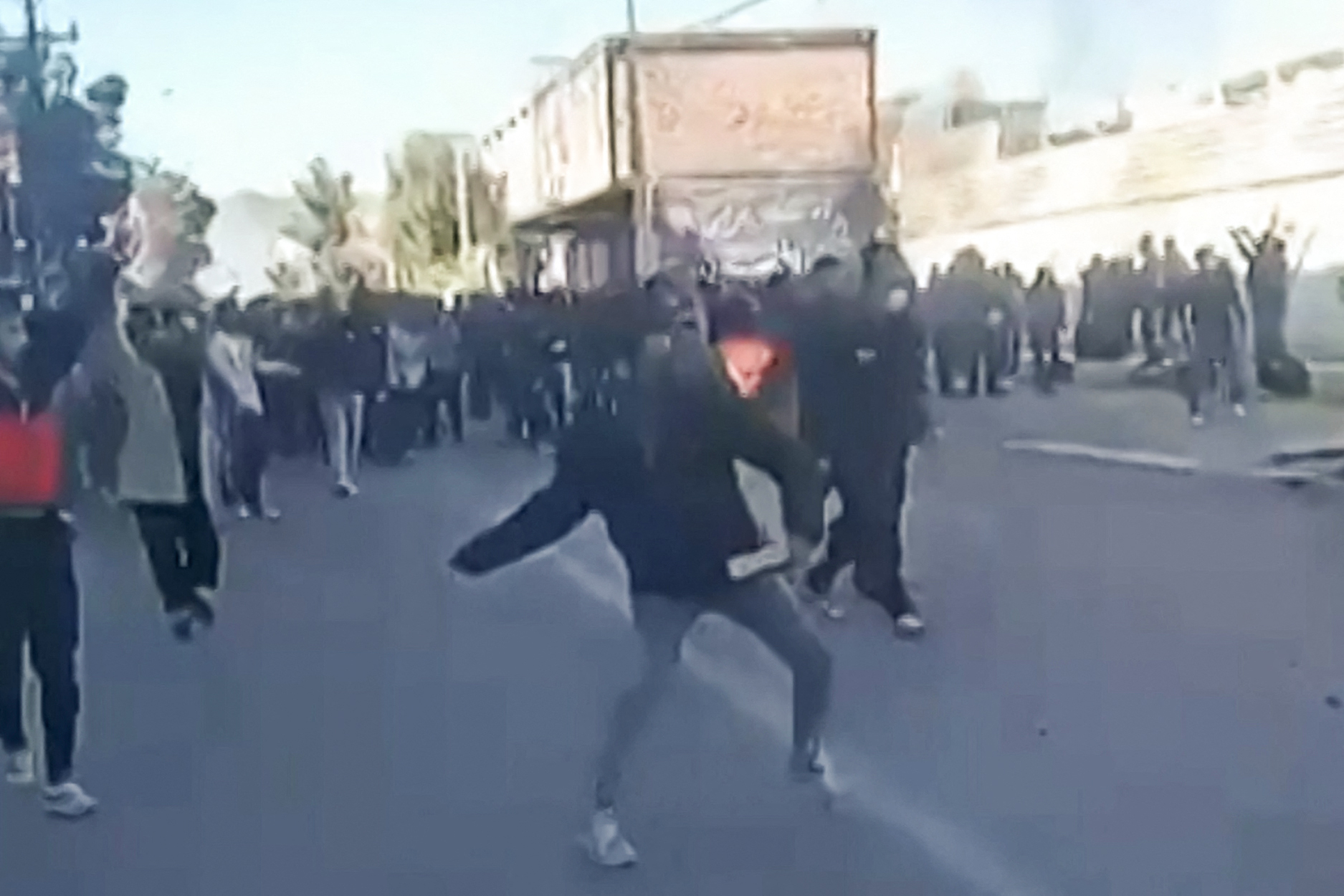 Protesters attacking a government building in Fasa, southern Iran.