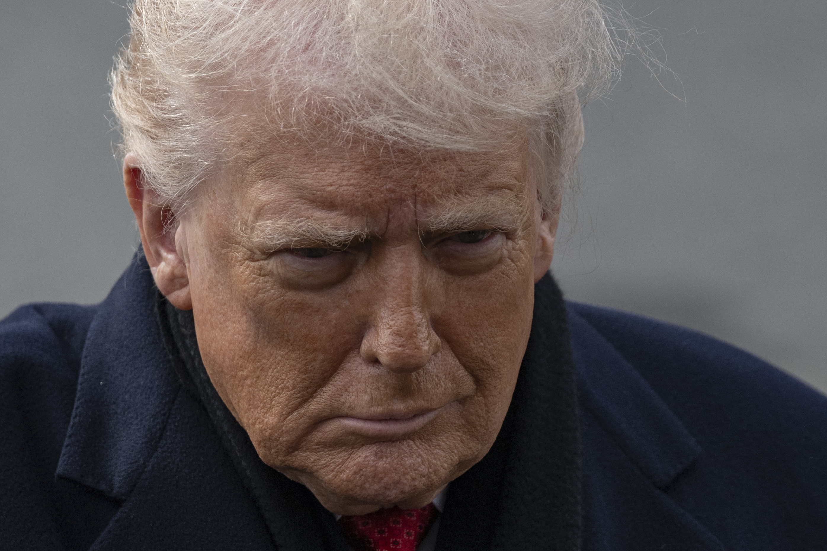 Close-up of Donald Trump speaking to the press.